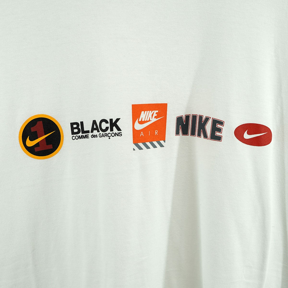 BLACK COMME DES GARCONS×NIKE 古着・中古 24SS綿天竺 NIKE ロゴ オーバーサイズ Tシャツ