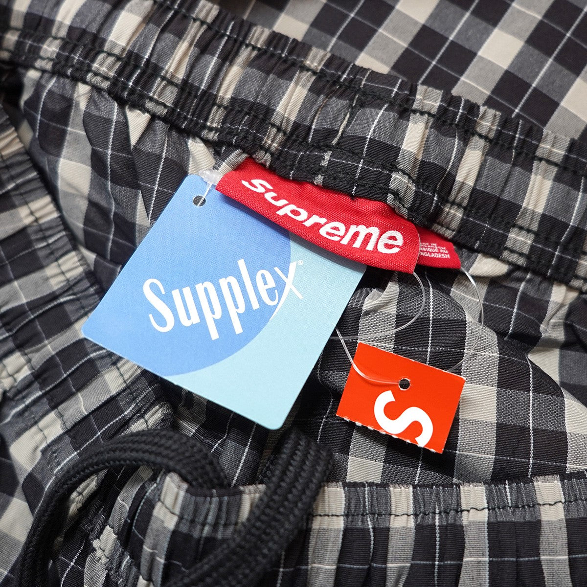 25AW Plaid Warm Up Pant サプレックス Supplex  ナイロンプレイド チェック サイド ジップ ロゴ刺繍 トラック ウォームアップ イージー パンツ