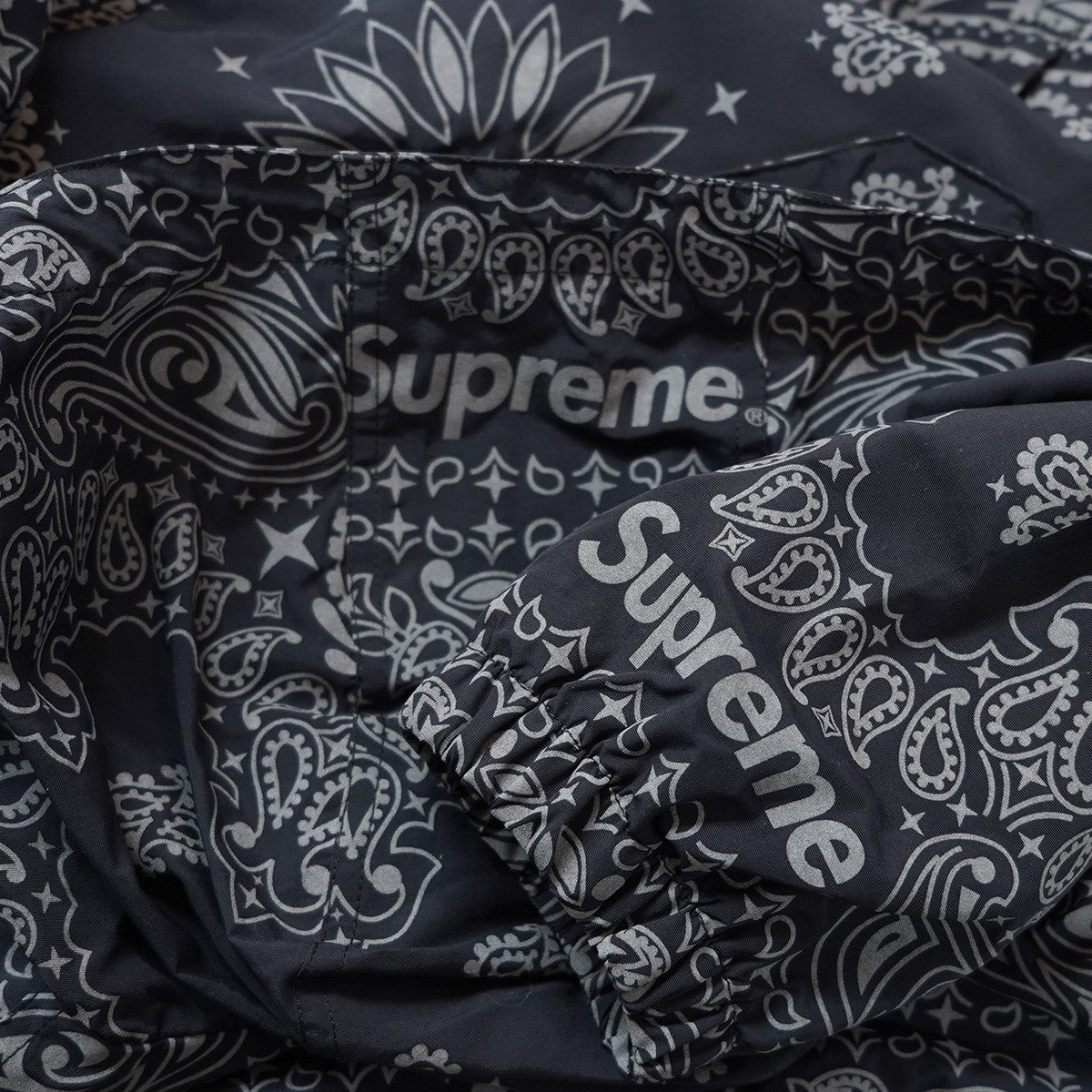 26SS Reflective Bandana Anorak リフレクティブ バンダナ ペイズリー 総柄ドローコード カンガルーポケット ロゴ 織ネーム ジップアップ パーカー ジャケット