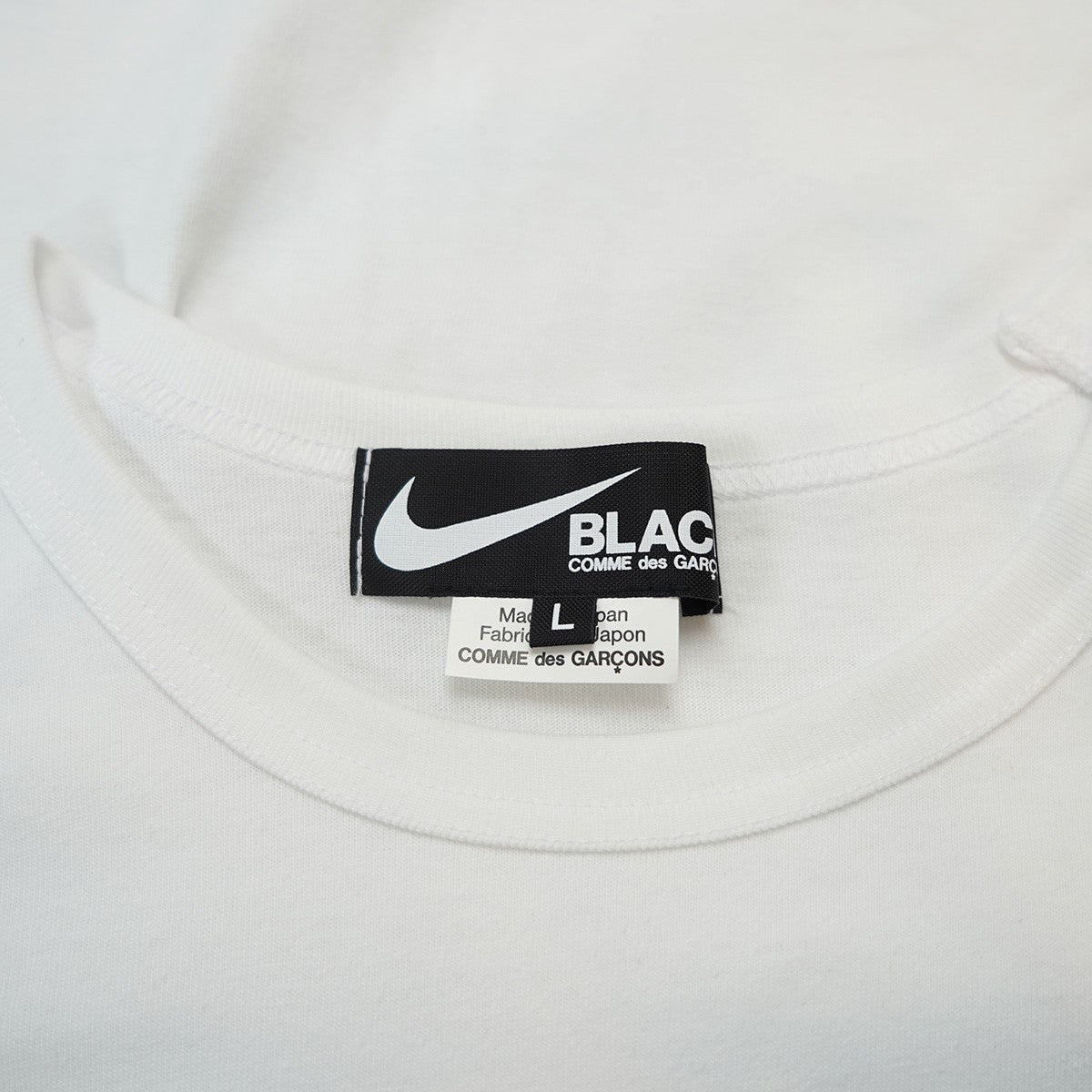 25AW 綿天竺NIKE x BLACK CDG コラボ タイポグラフィ 縦型スウッシュ ロゴ グラフィックVintage ヴィンテージ調 プリント オーバーサイズ 半袖 Tシャツ
