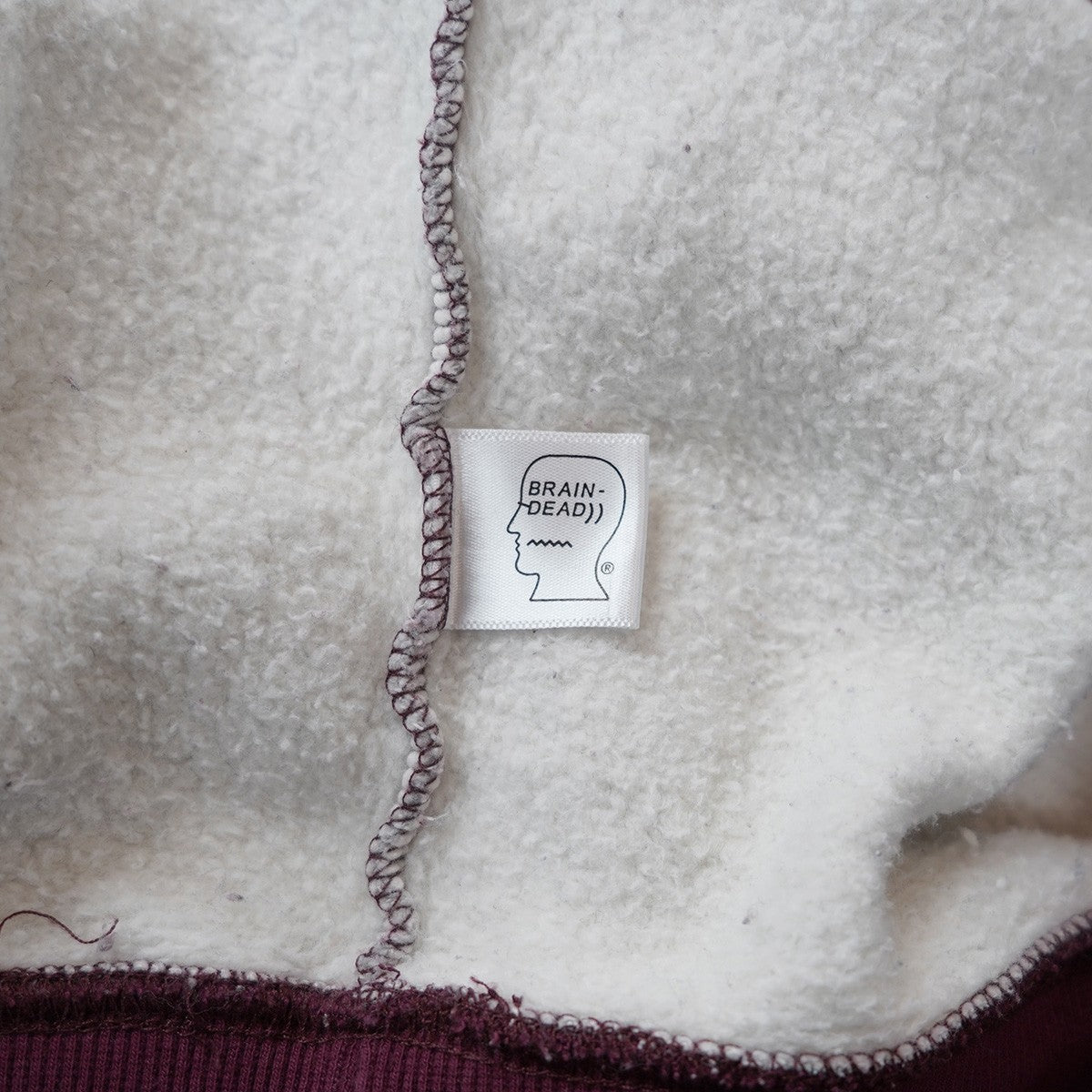 24AW FLEECE LOGO HEAD RAGLAN HOODIEロゴ ヘッド ラグラン 切替 フーディー パーカー