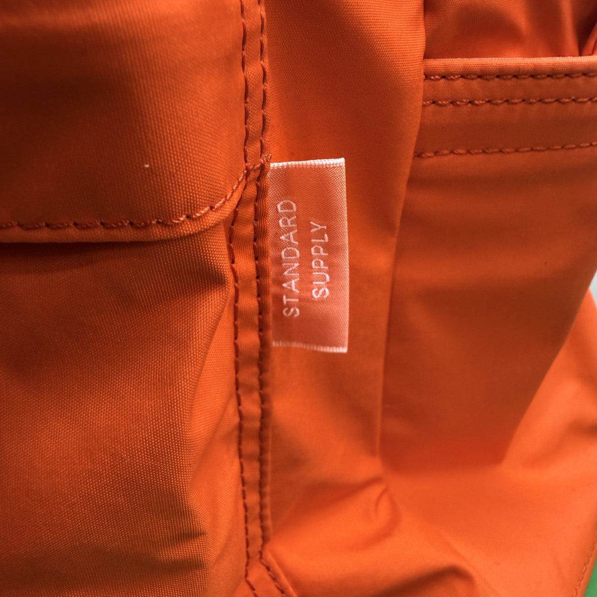 STANDARD SUPPLY×BEAMS PLUS 26SS/50周年 Daily Day Pack BEAMS ORANGE 18LBEAMS ORANGE／デイリーデイパック バックパック/38-61-0169-131-45 古着・中古-7枚目のアイテム画像