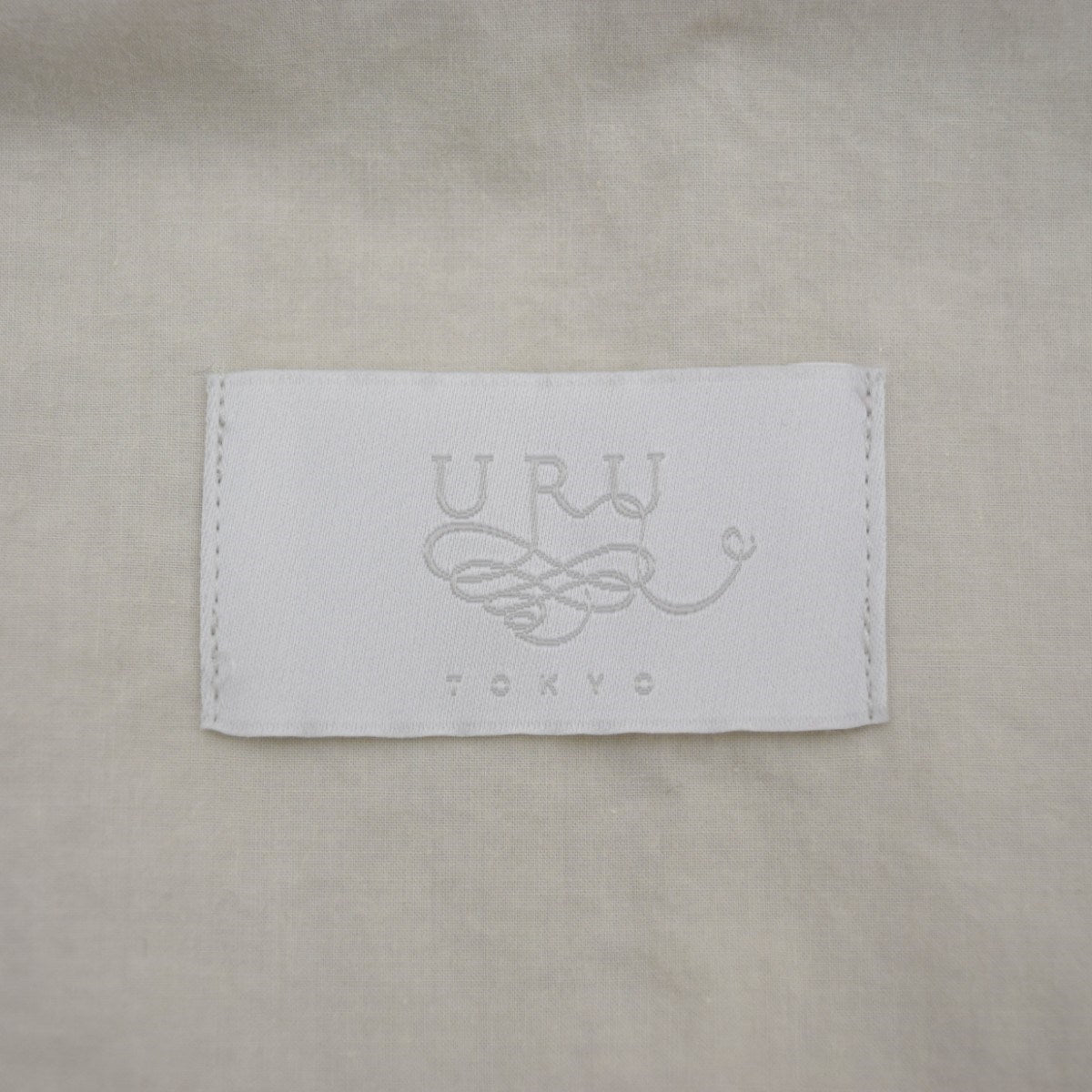 URU(ウル) COLOR PIN WEATHER ／ BUTTONLESS JACKETジャケット