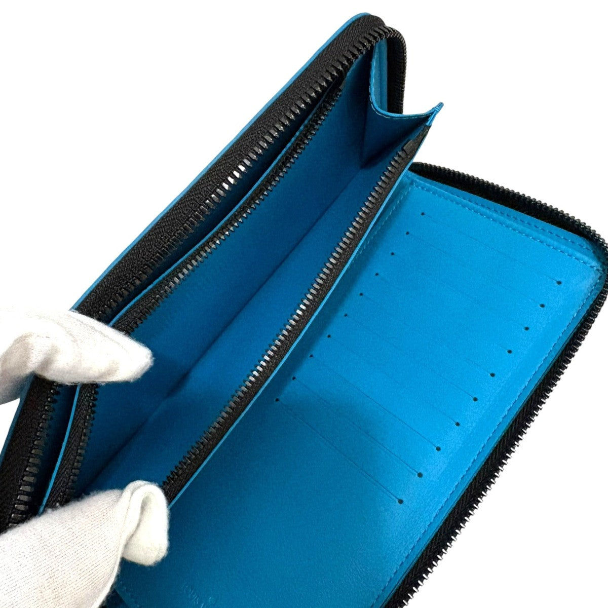ジッピーウォレット・ヴェルティカルトリヨンモノグラム M69048　長財布　ロングジップウォレット