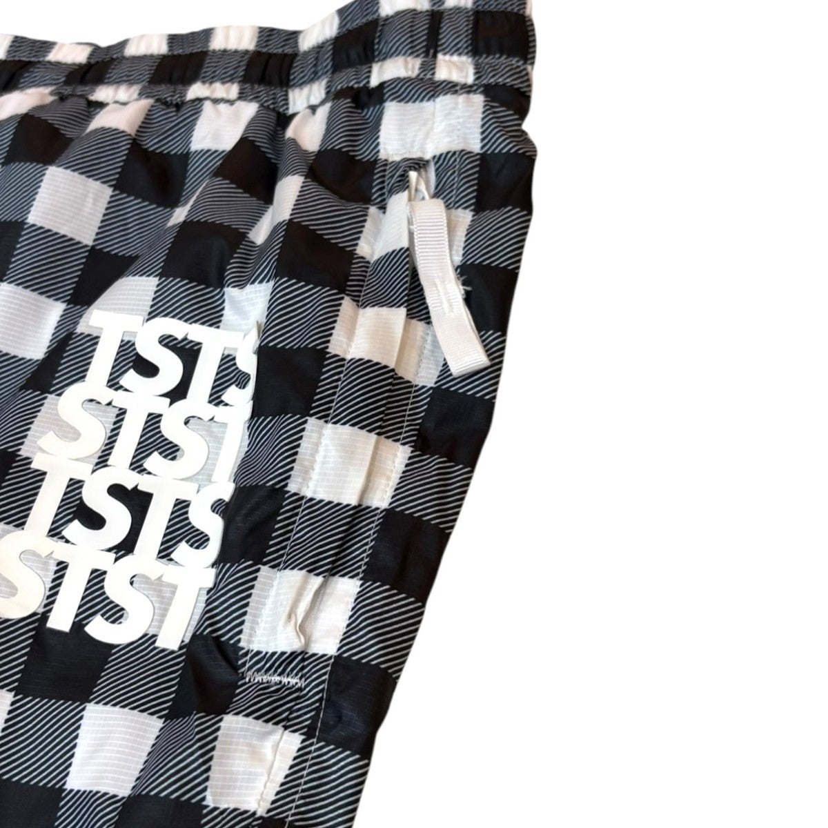 POLYESTER WIND PANTS チェックパンツ26SMM0301