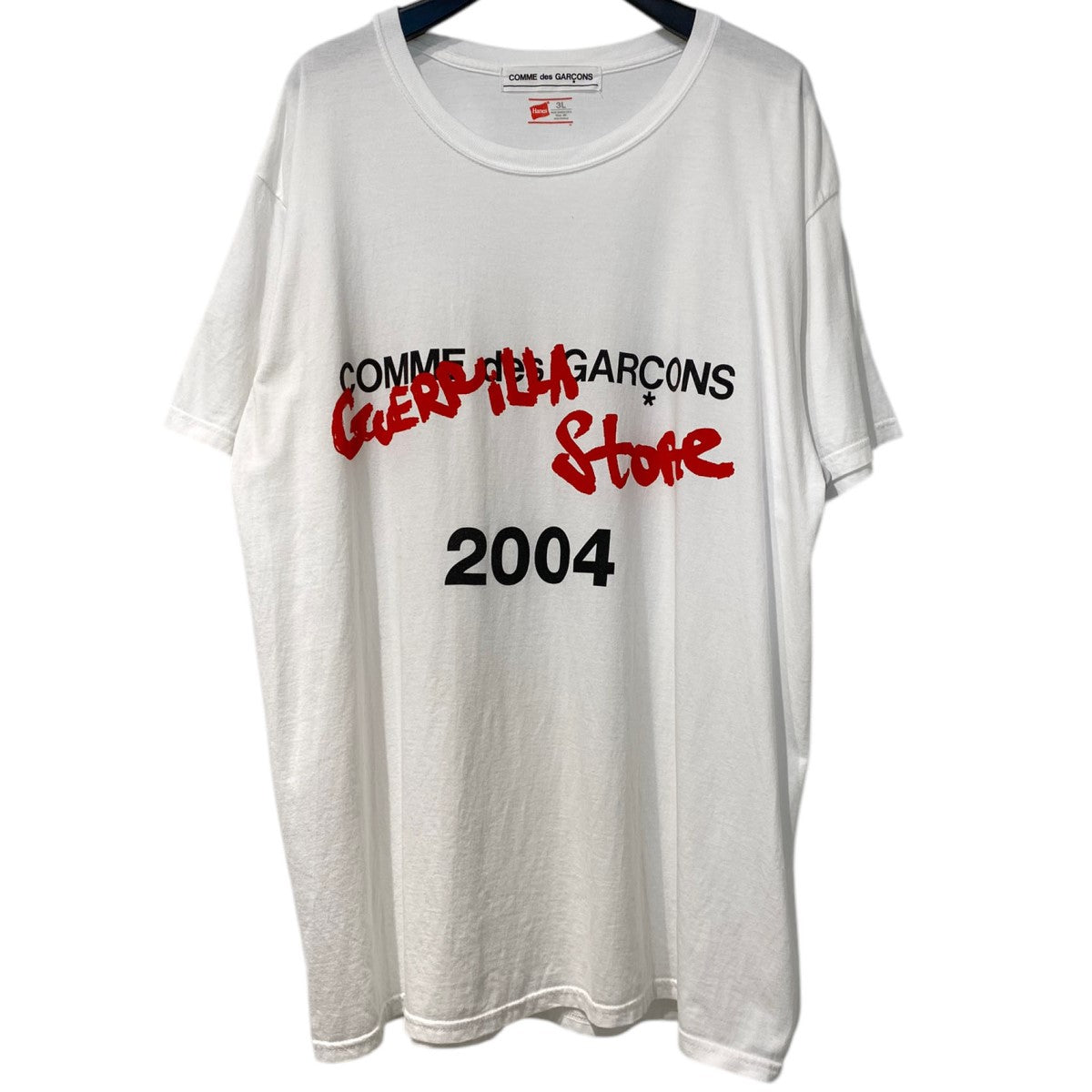 COMME des GARCONS 21SSGUERILLA STORE 限定ロゴプリントTシャツ 古着・中古-1枚目のアイテム画像