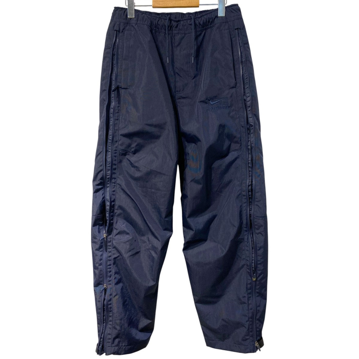 STUSSY×NIKE 25FWUtility Pant Obsidian HQ8545-451サイドZIPイージーナイロンパンツHQ8545-451 古着・中古-1枚目のアイテム画像