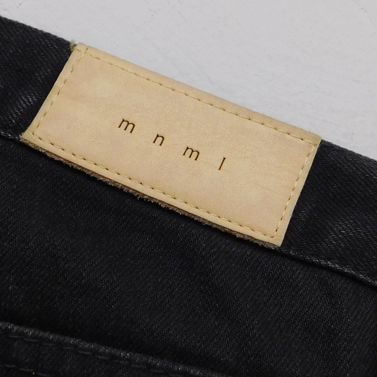 裾ジップダメージ加工デニムパンツ