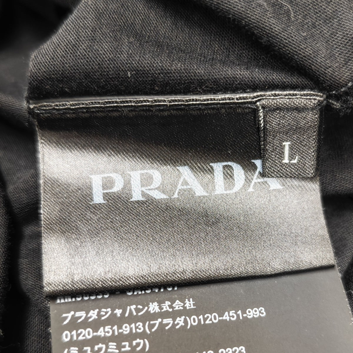 トライアングルタグ VネックTシャツ
