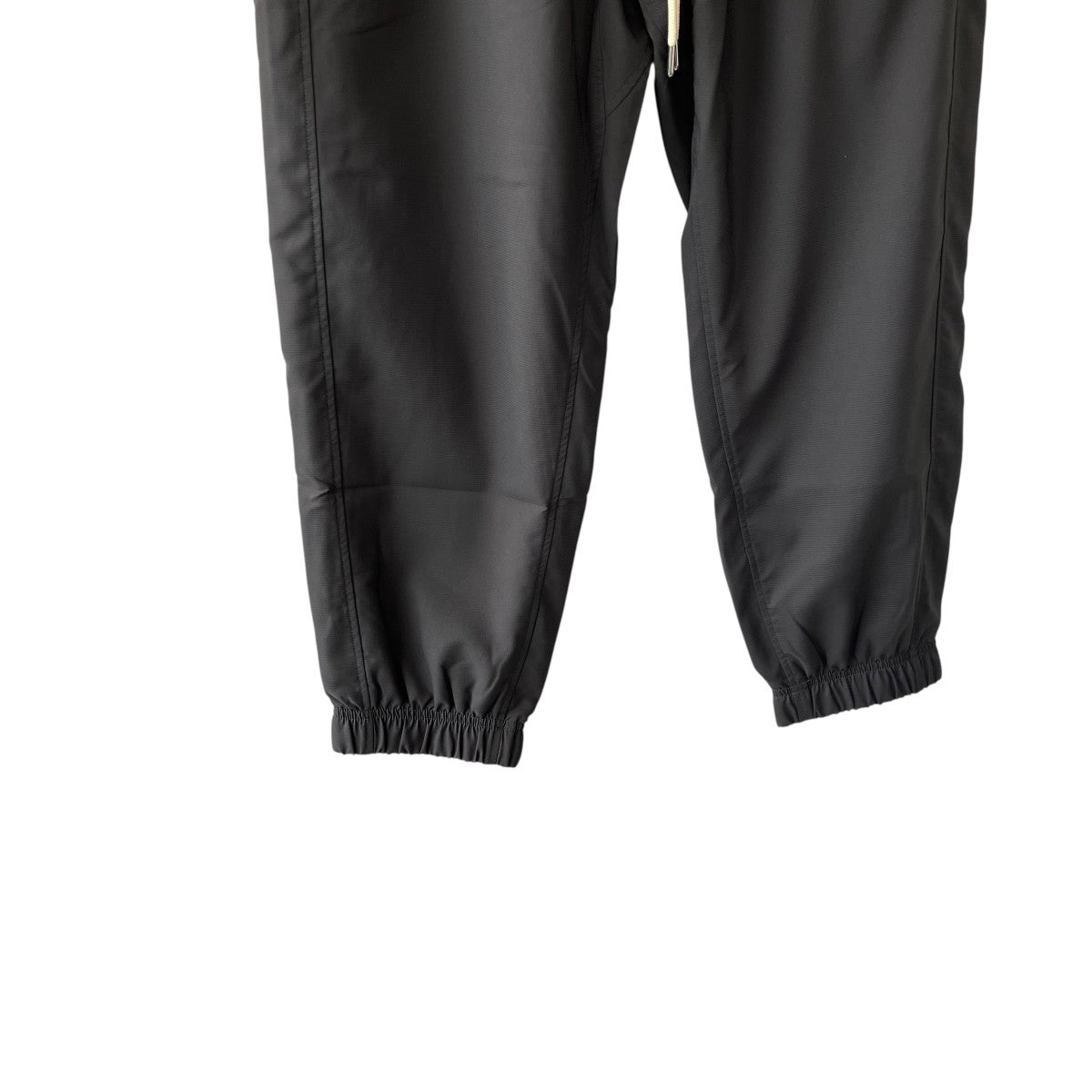 Logo Anywhere Pantsナイロンパンツ