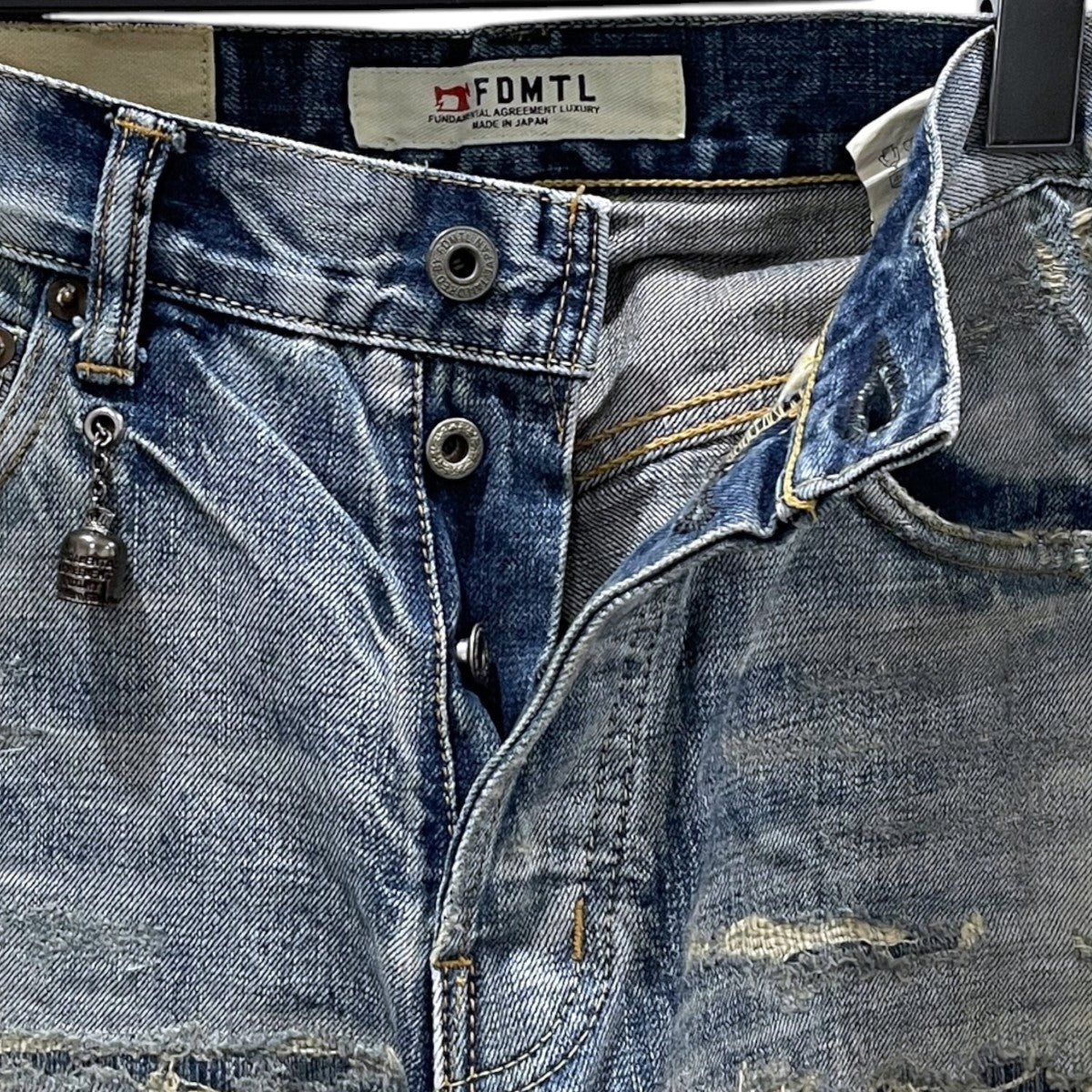 ダメージリペア加工デニムパンツ