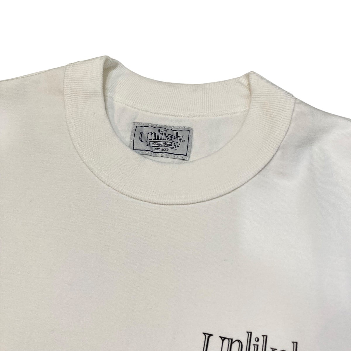 UNLIKELY(アンライクリー) Unlikely Team TeeクルーネックT