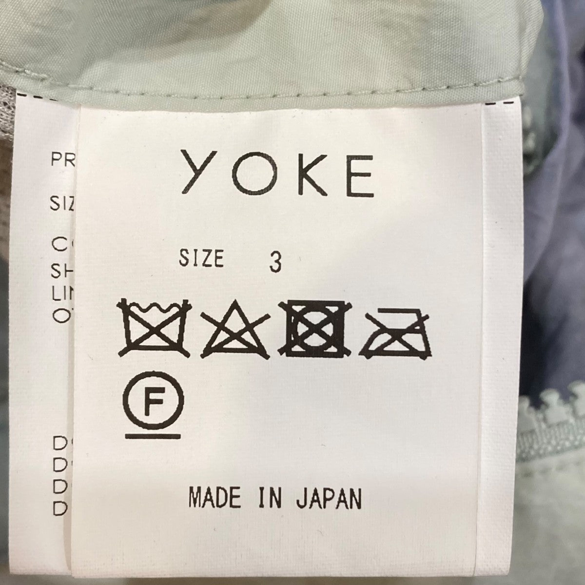 YOKE(ヨーク) SPRAY PRINTED NYLON ZIP BLOUSONジップアップ