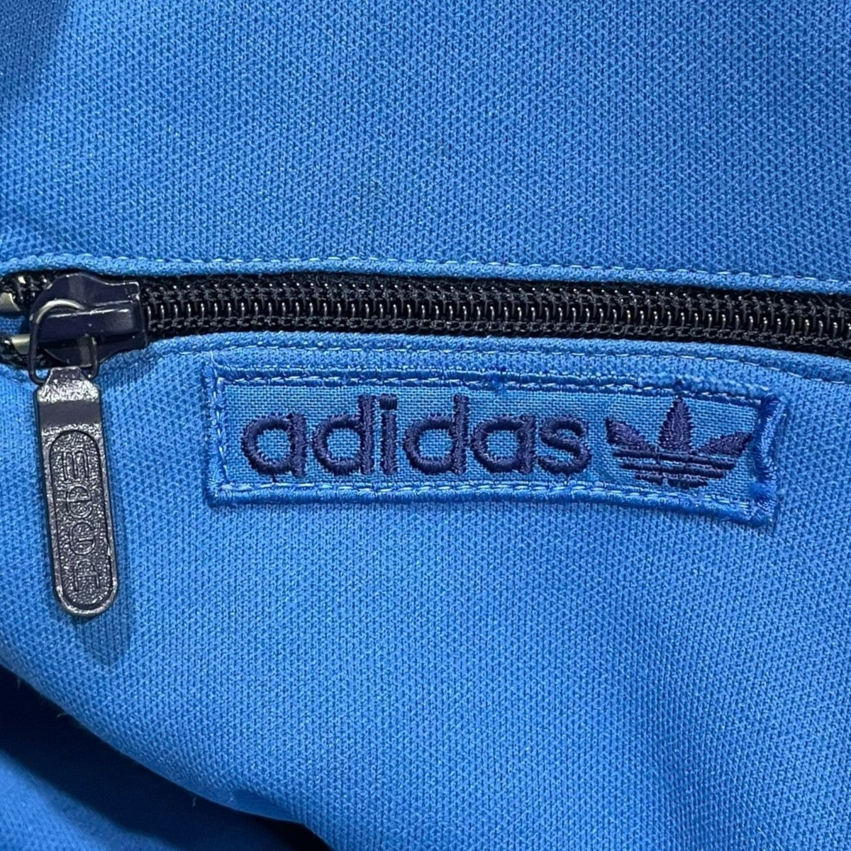 adidas(アディダス) トラックジャケット 万国旗タグ ブルー・ネイビー