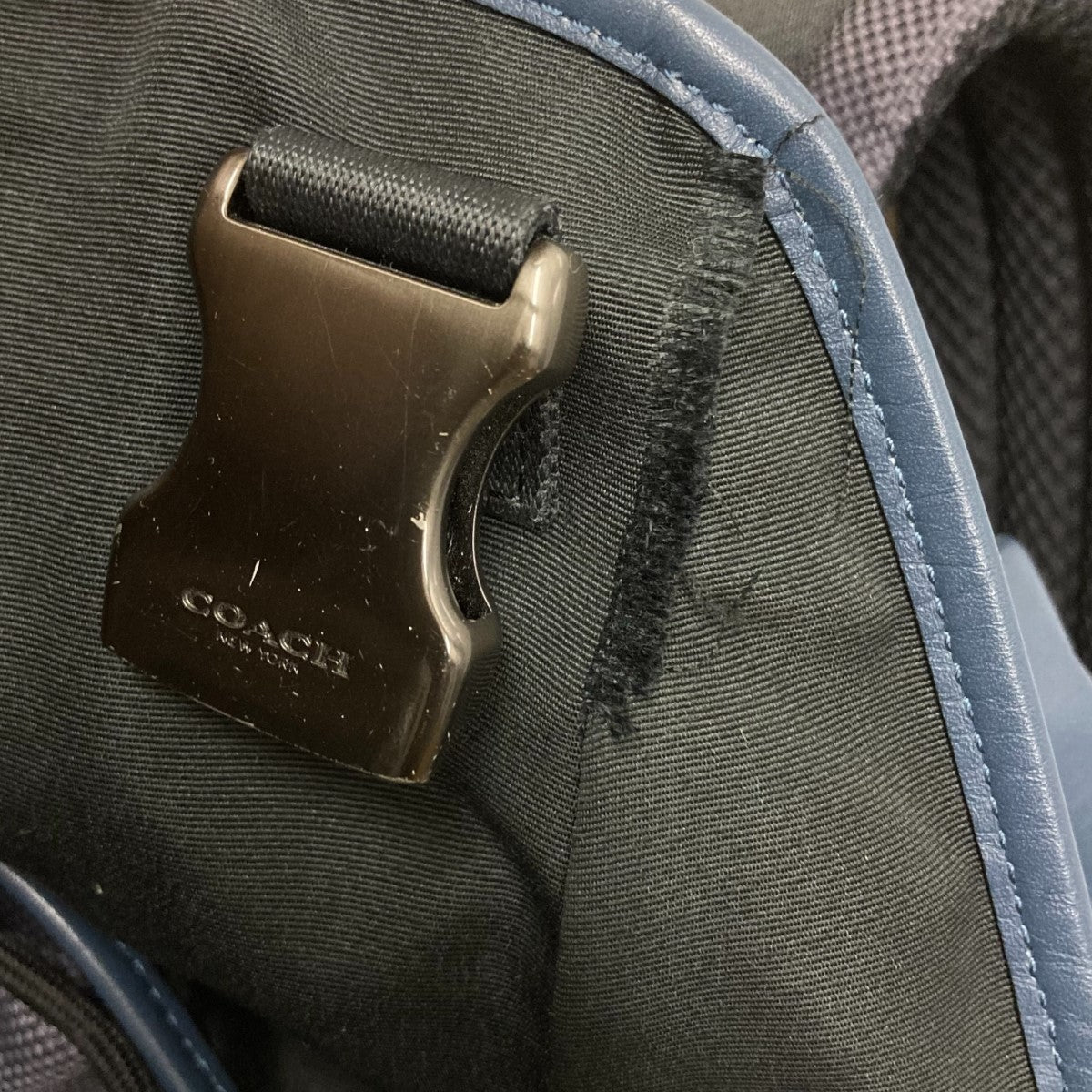 COACH(コーチ) パフォレイテッドレザートレックバックパック