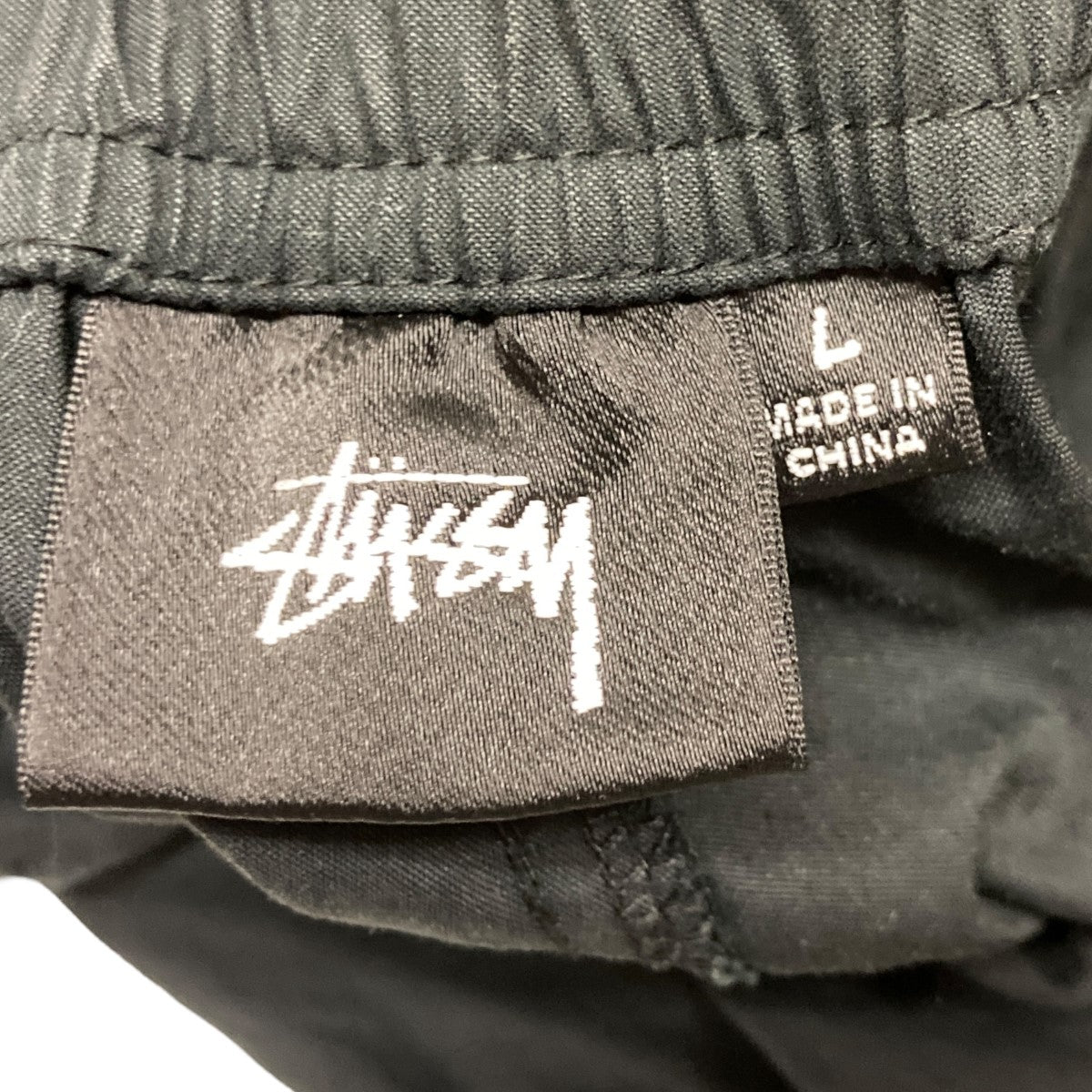 stussy(ステューシー) nyco over trousersワークパンツ ブラック