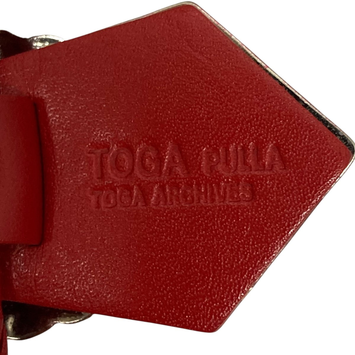 TOGA PULLA(トーガプルラ) Motif leather loop tieループタイ
