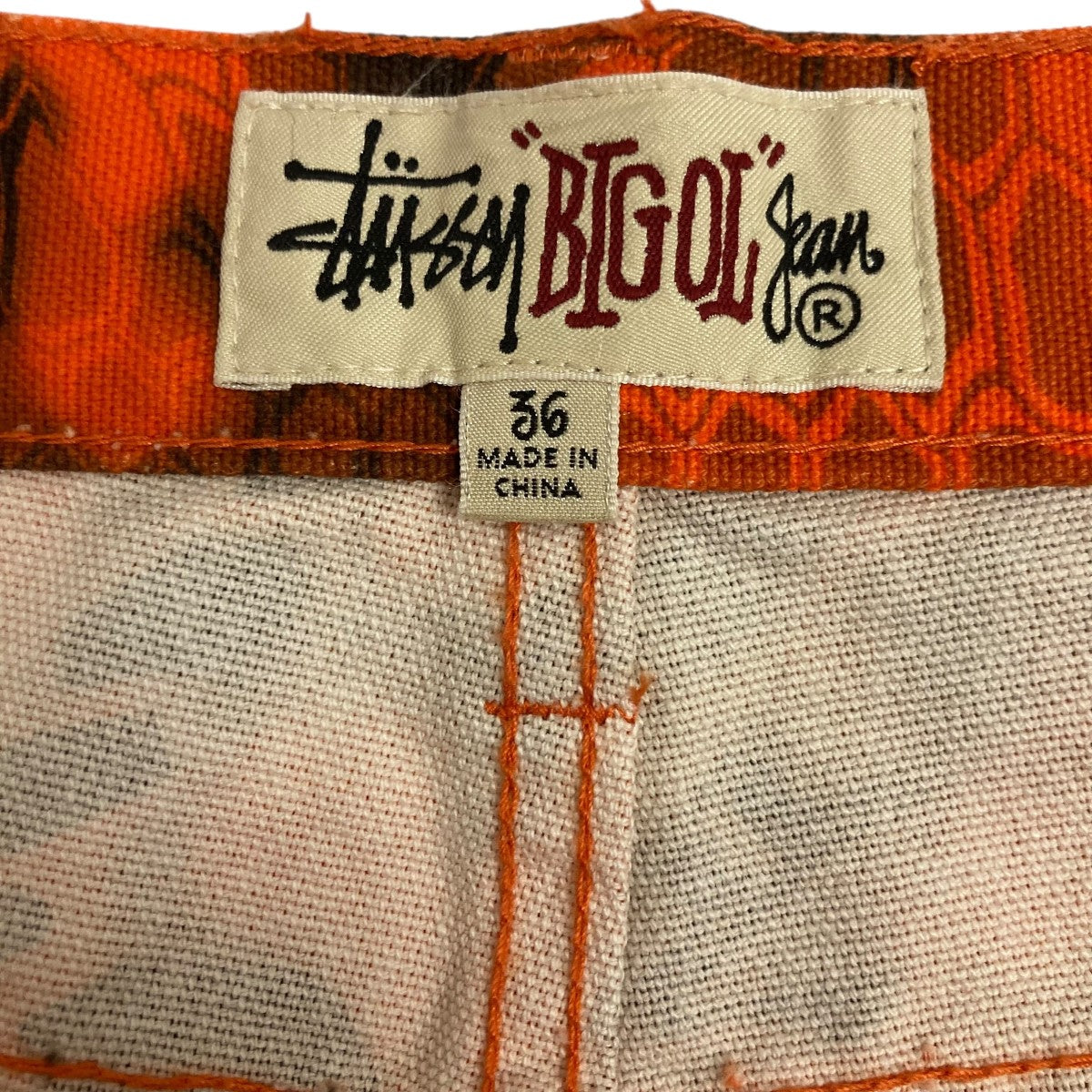 stussy(ステューシー) BIG OL JEANS総柄デニムパンツ オレンジ サイズ