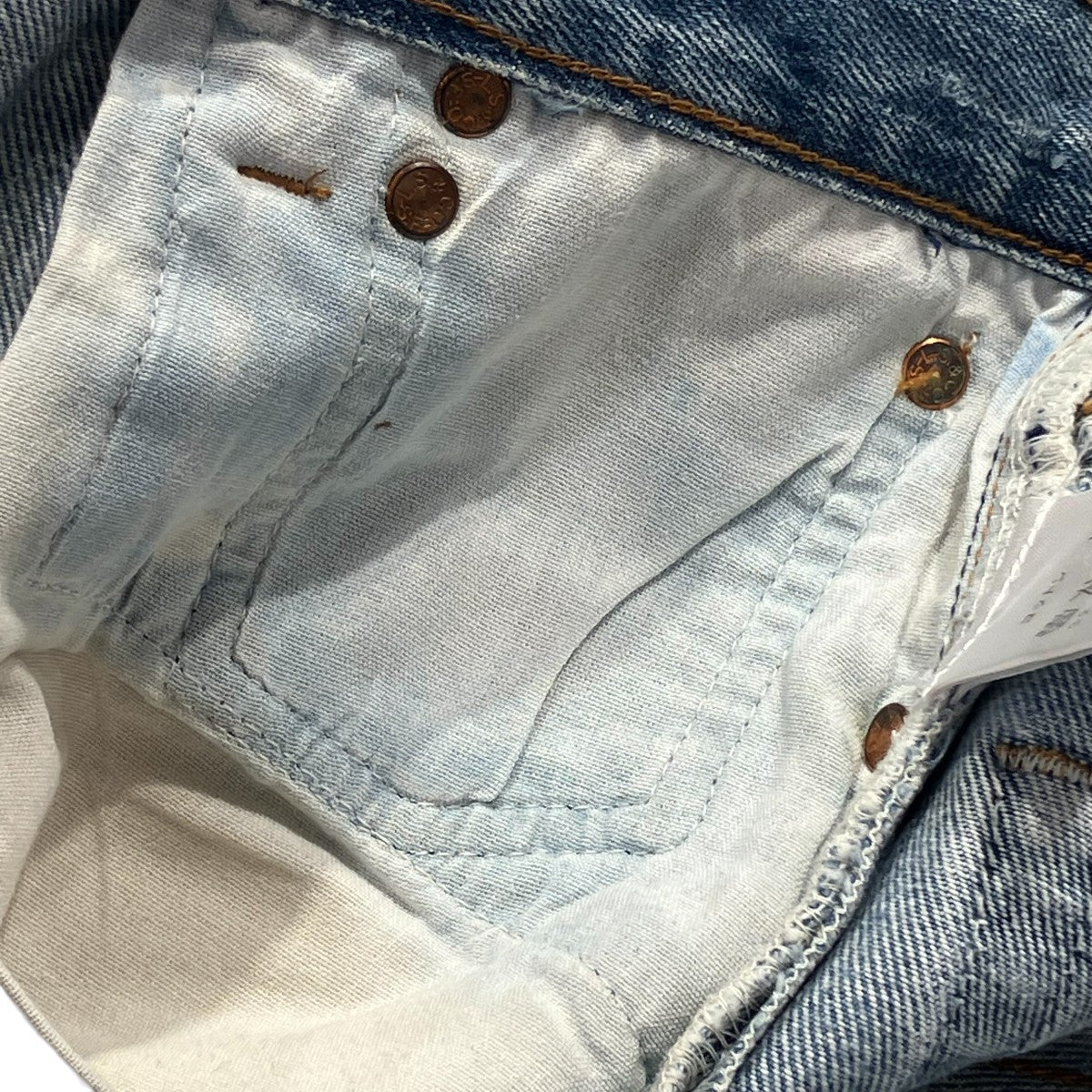 ダメージ加工デニムパンツ