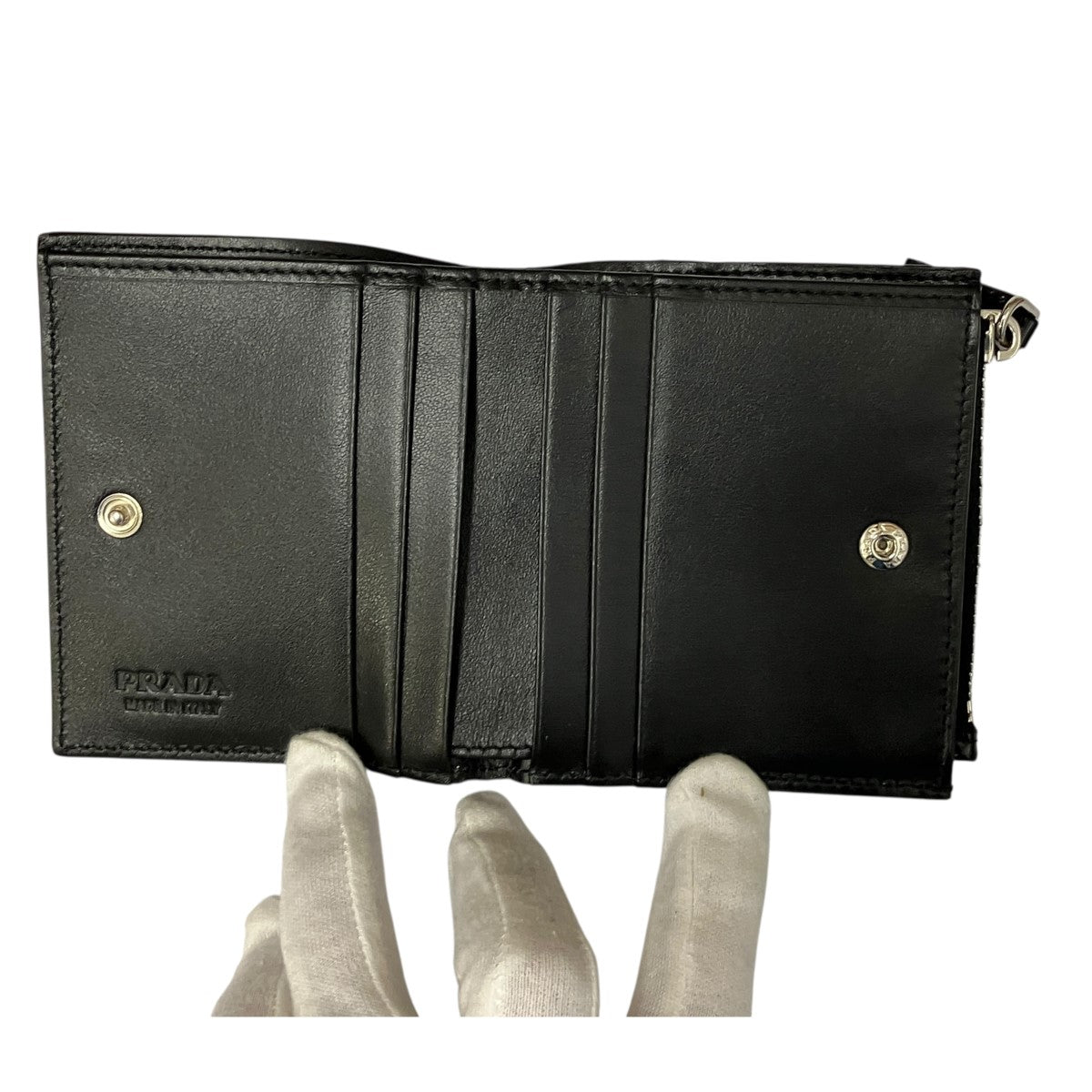 ロゴブラッシュドレザー二つ折り財布