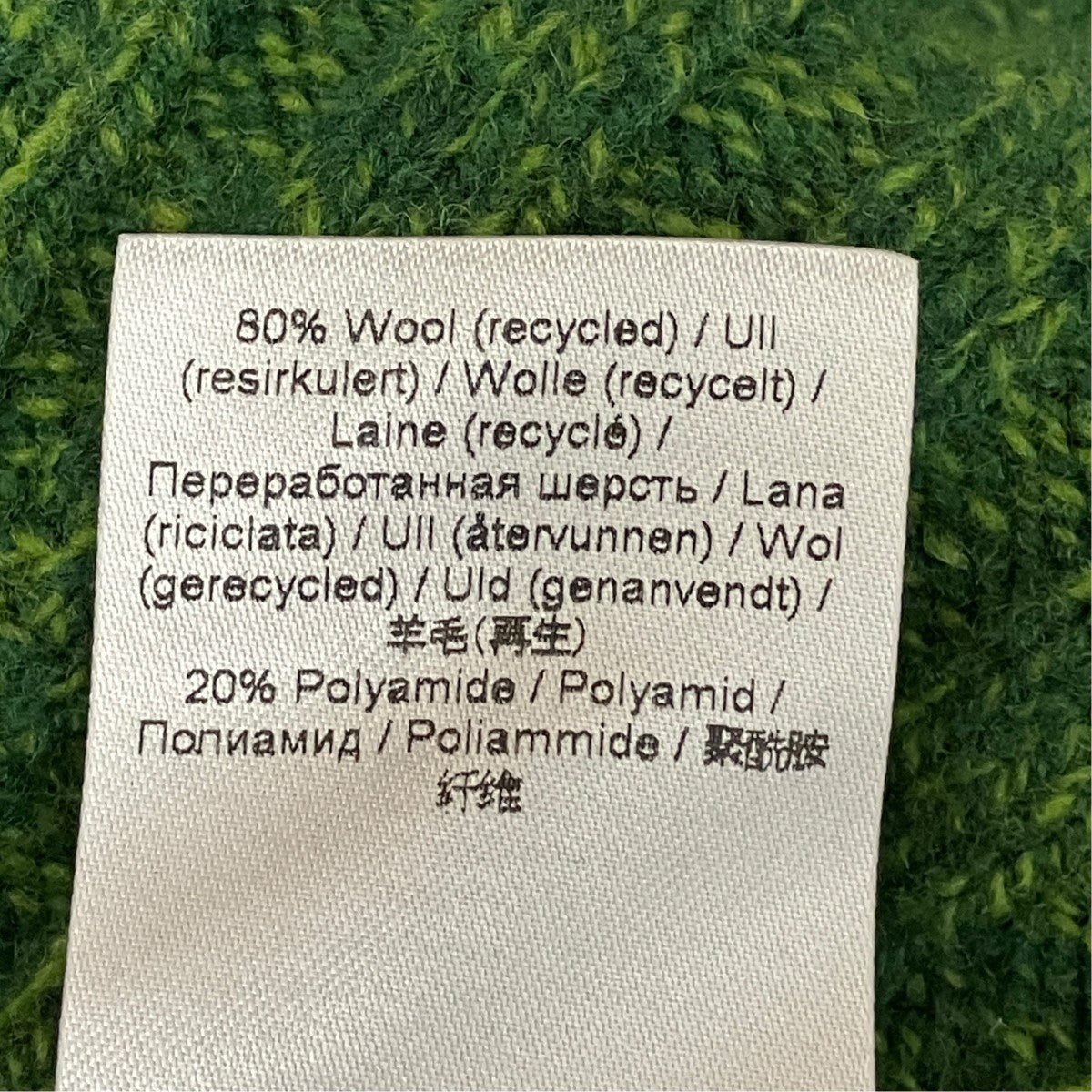 ビジューボタンノースリーブニット