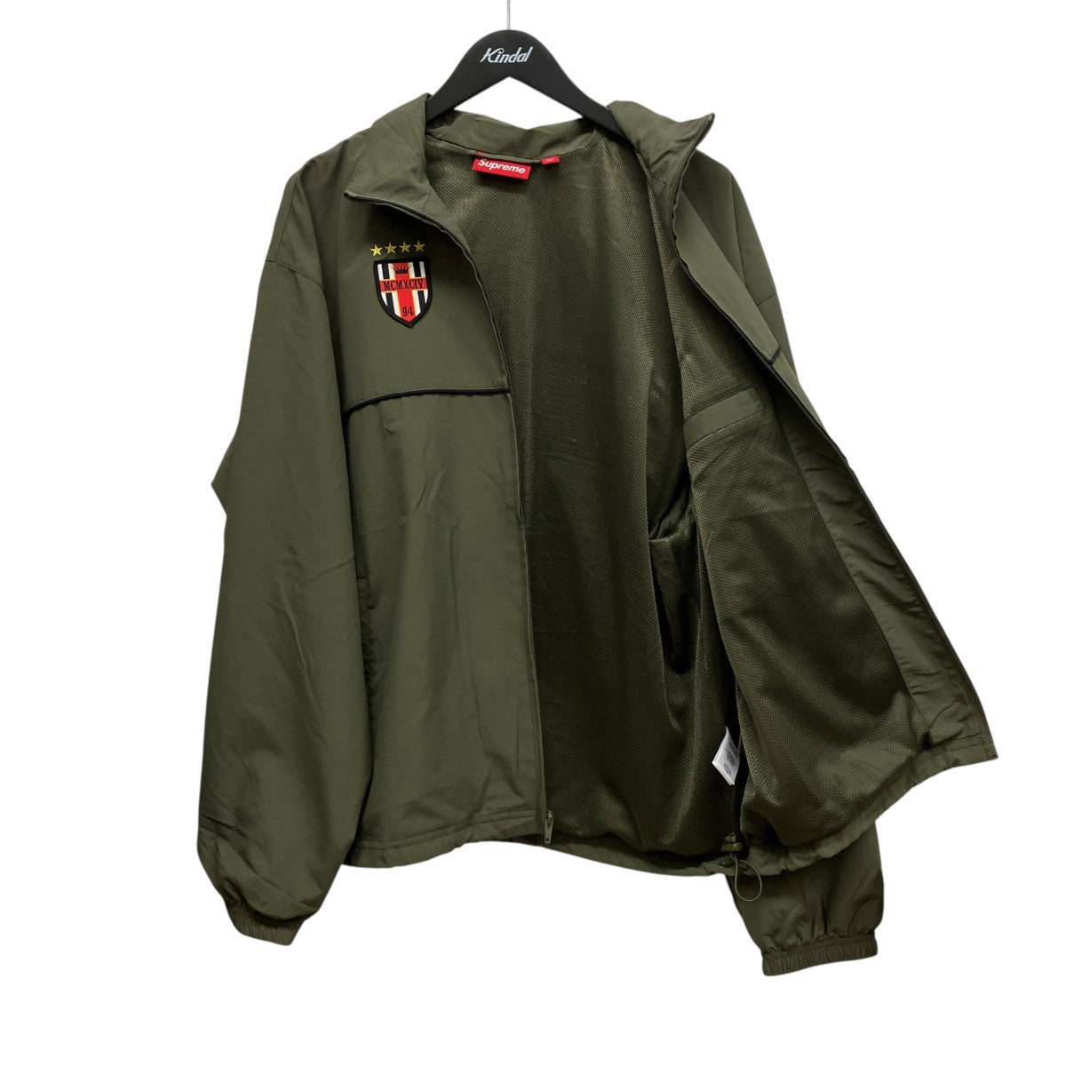 26AWCross Track Jacketバック刺しゅうワッペンナイロンジップアップジャケット