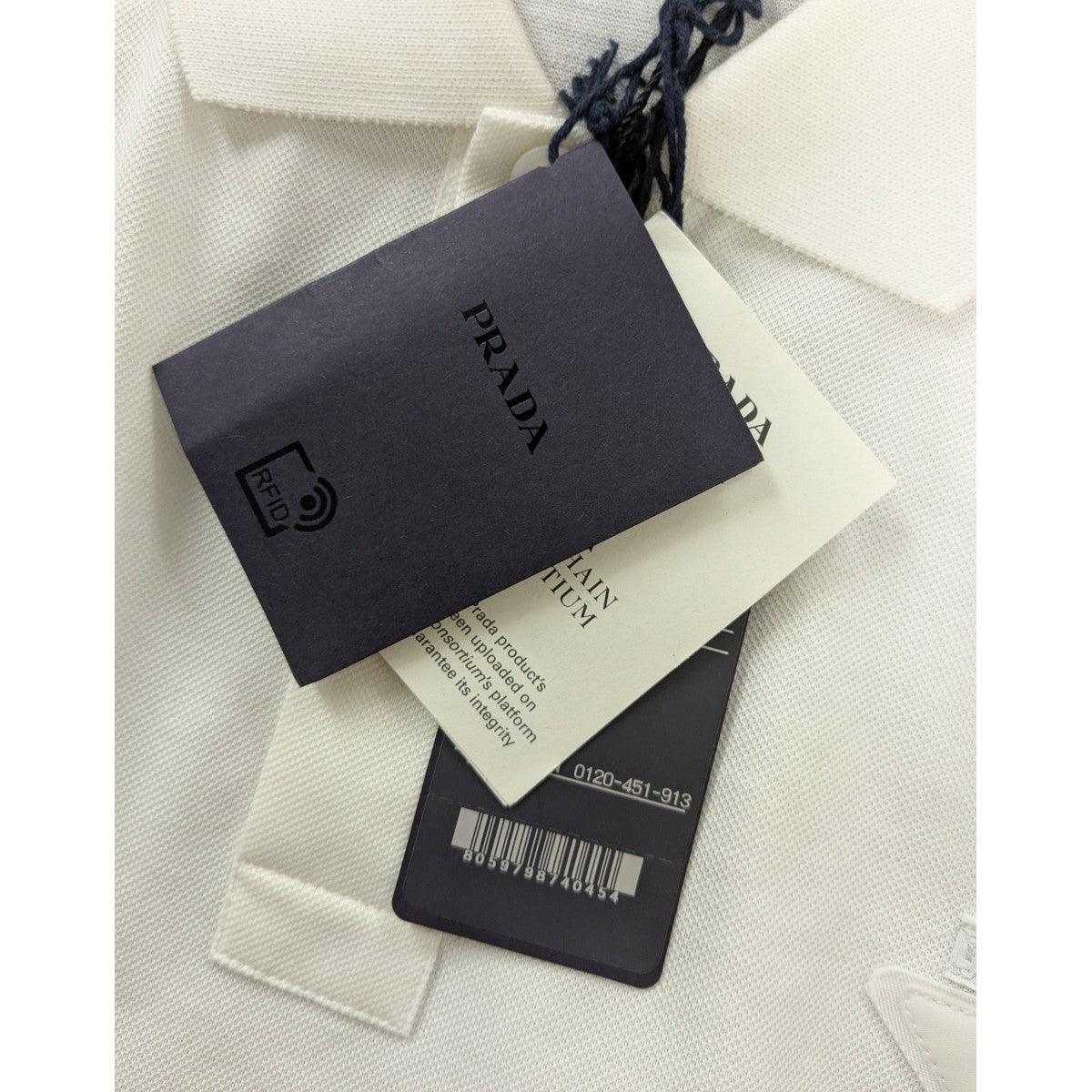 PRADA(プラダ) トライアングルロゴピケロングポロシャツ UJN868