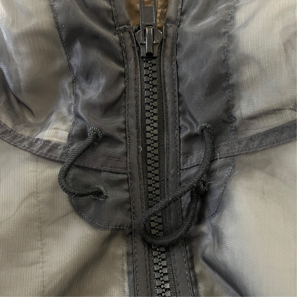 02AW Monofilament Jacket． モノフィラメントフーデッドジャケット