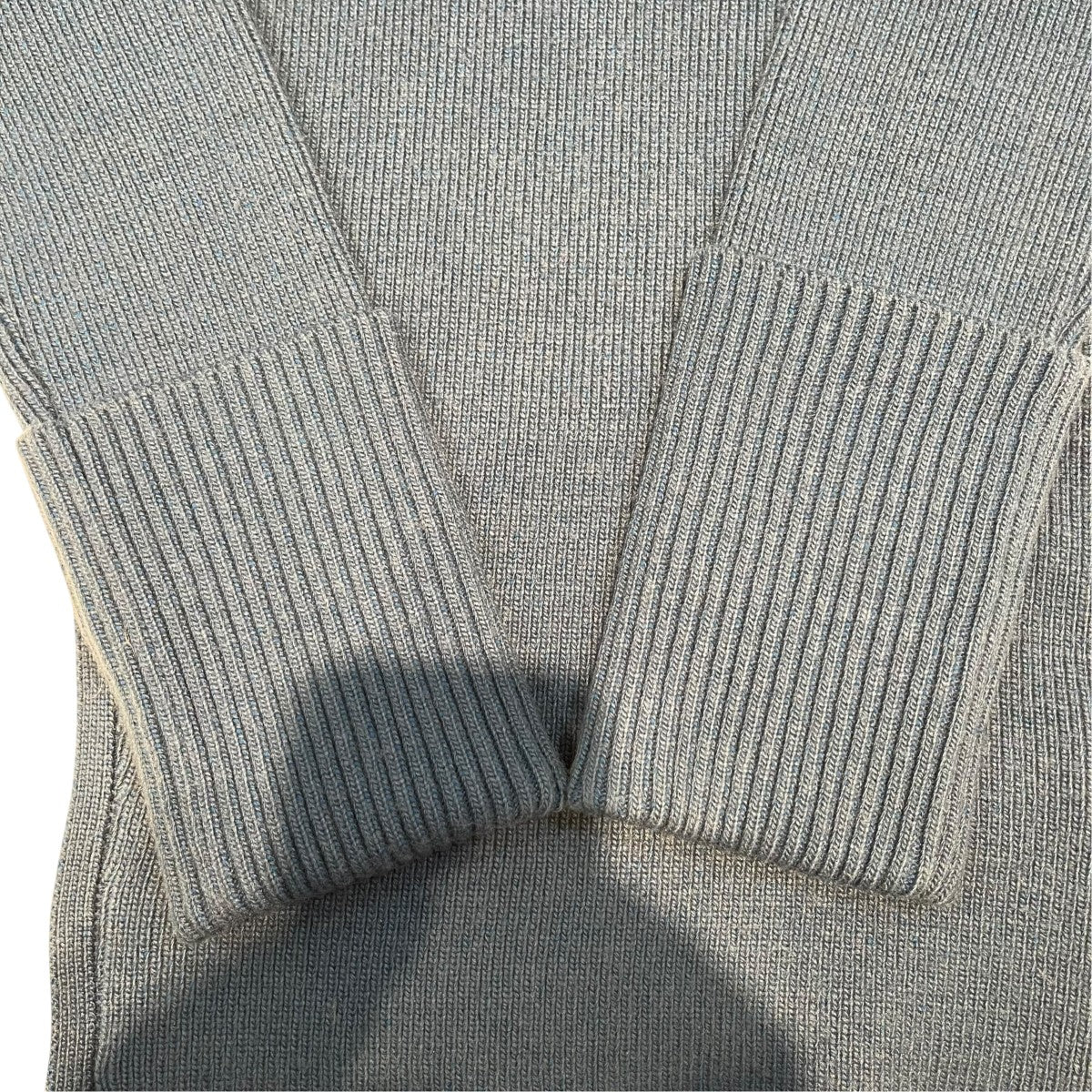 SLANT CUT KNIT TOPS
