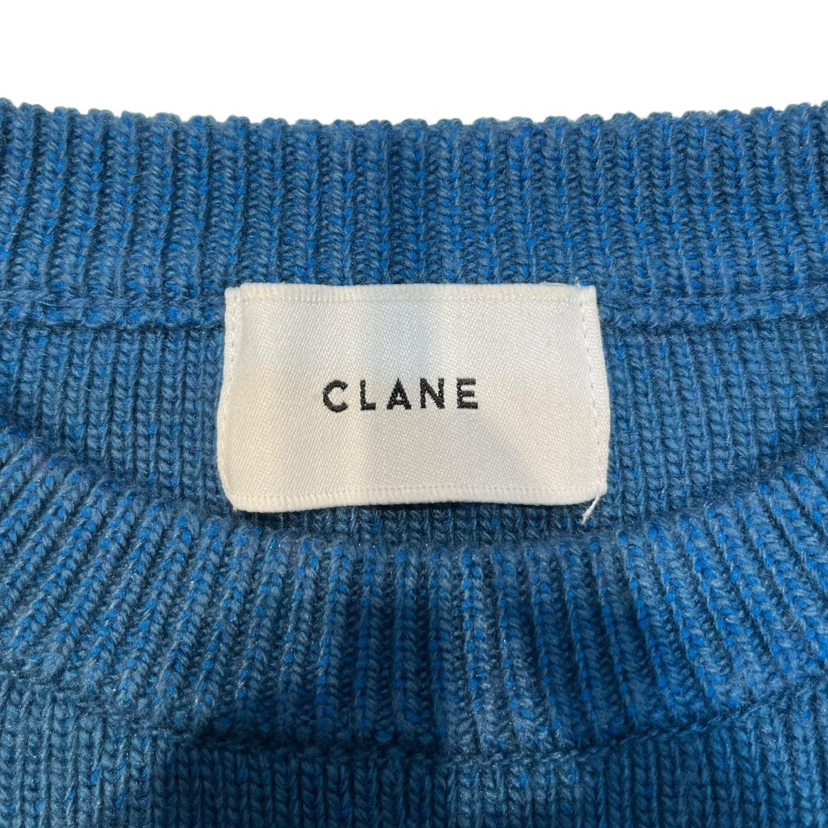SLANT CUT KNIT TOPS