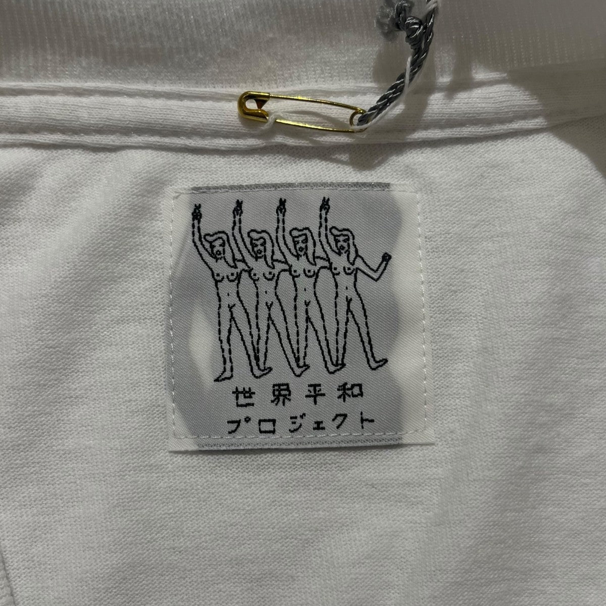 世界平和ﾌﾟﾛｼﾞｪｸﾄプリントCREW NECK T-SHIRT24SS-WMT-TEE07