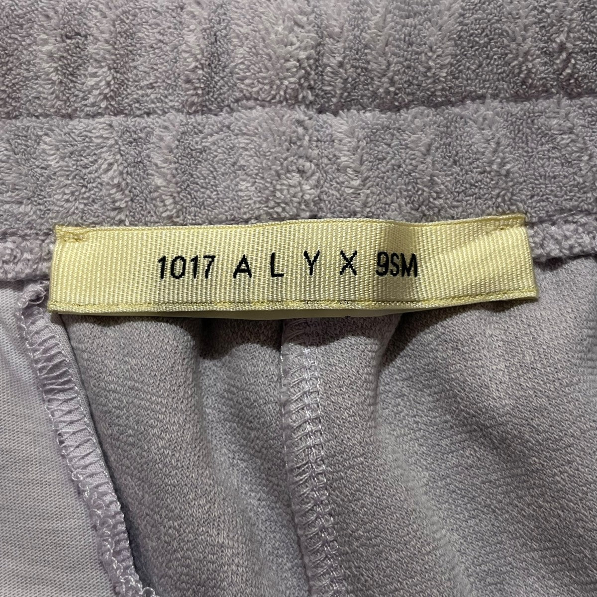 1017 ALYX 9SM(アリクス) 裾ロゴ刺繍パイル地スウェットパンツ