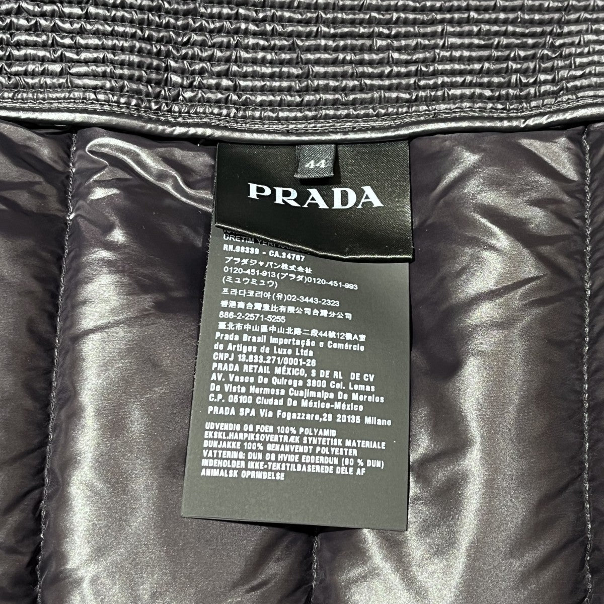 アームトライアングルロゴ プレート ダウンジャケット SGA654 三角プレート