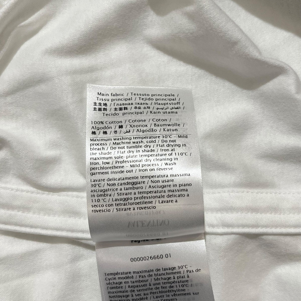 裾タグTシャツ