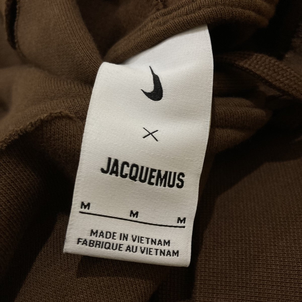 NIKE×JACQUEMUS NRG HE SWOOSH L S HOODIEスウィッシュ柄カットアウトフーディーFJ3482-259の古着・中古アイテム