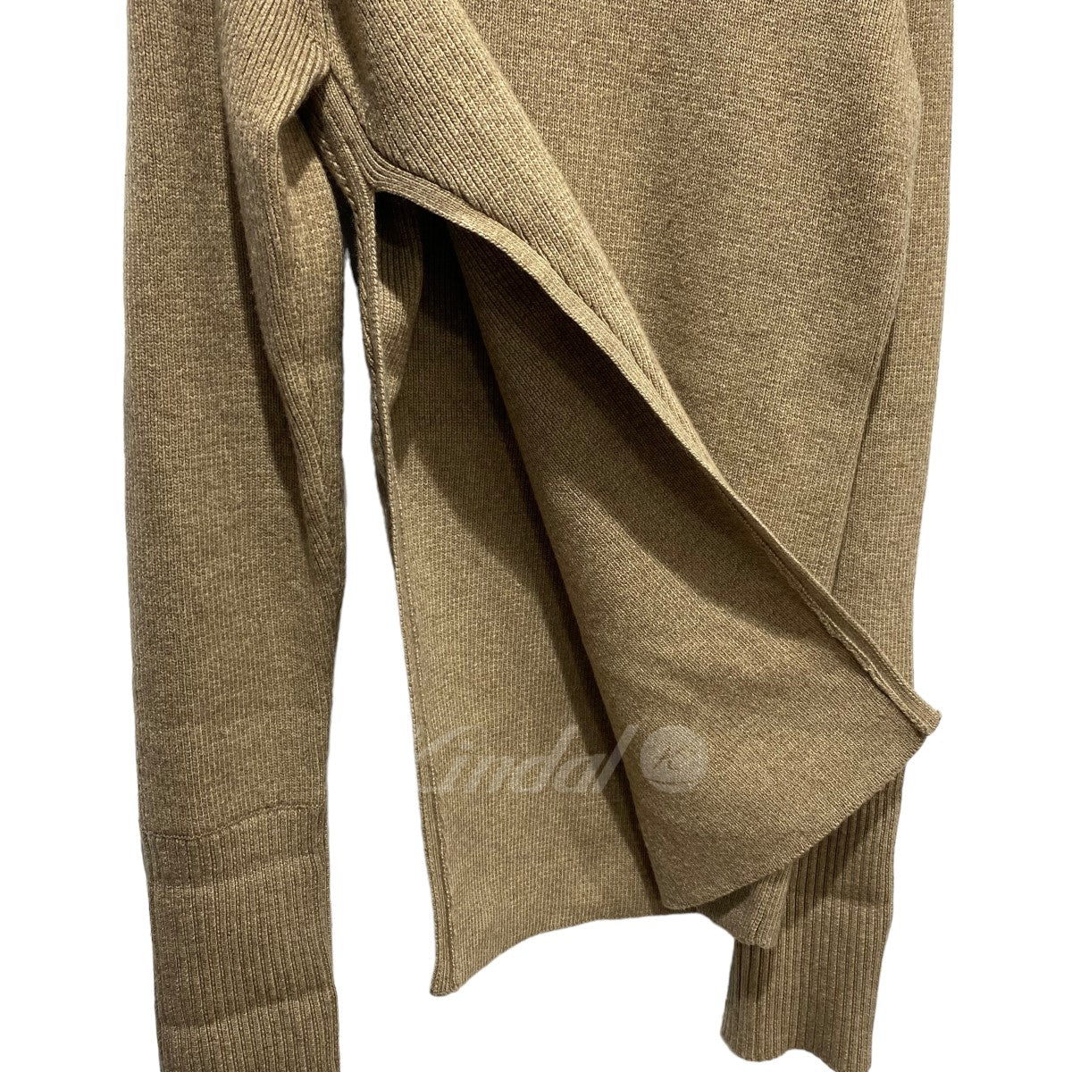 スラントカットニットトップス