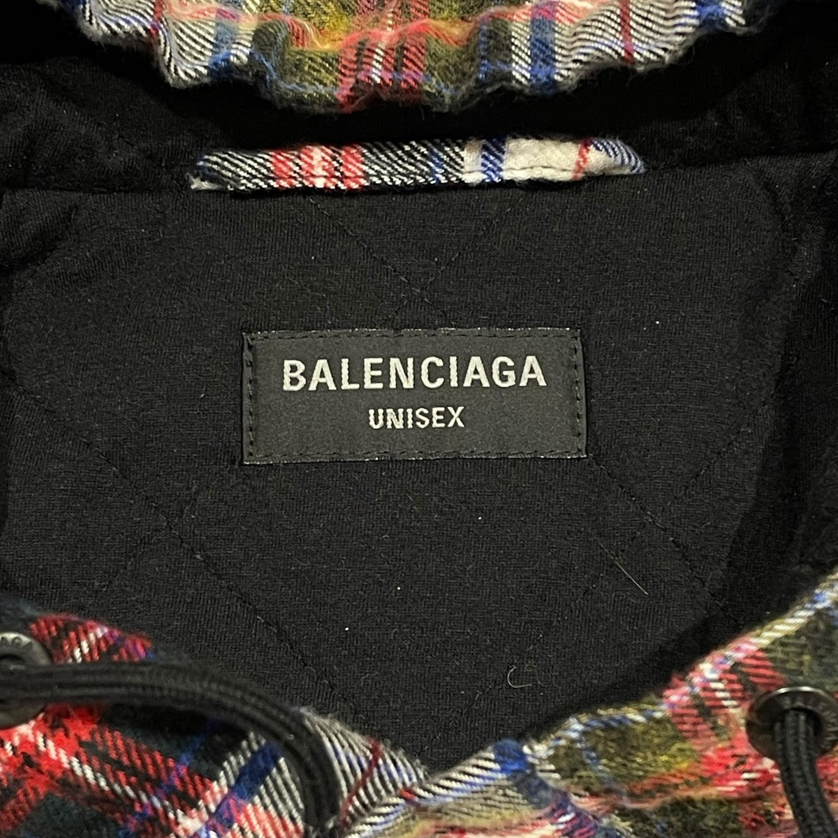 バレンシアガの23SS BLEACHED PLAID HOODED SHIRT シャツジャケット 699223です。 BALENCIAGA 古着・中古 アウター アイテム