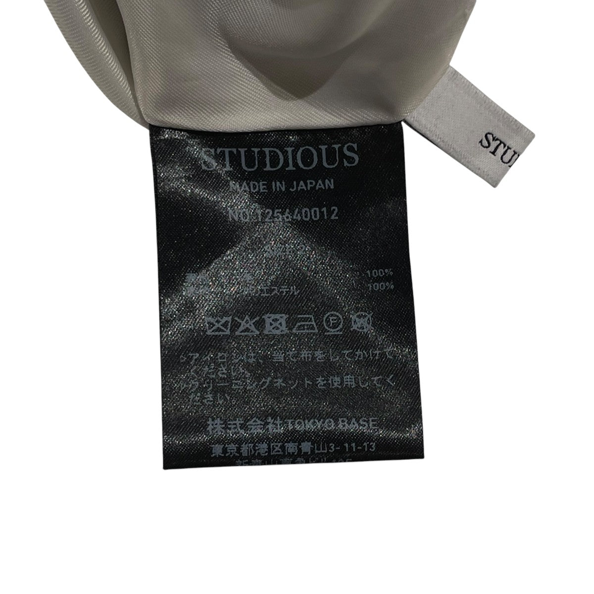 Asymmetric Tucked Flare Trousersスラックス125640012