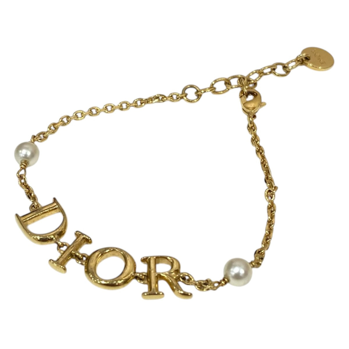 Christian Dior Dio(r)evolution フェイクパール 古着・中古-1枚目のアイテム画像