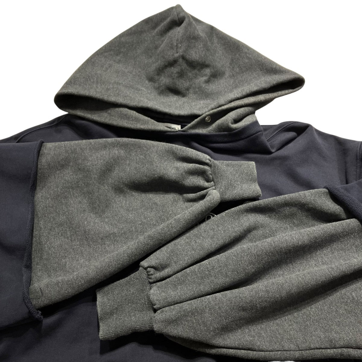 「COMBO HOODED SWEAT SHIRT」スウェットパーカー