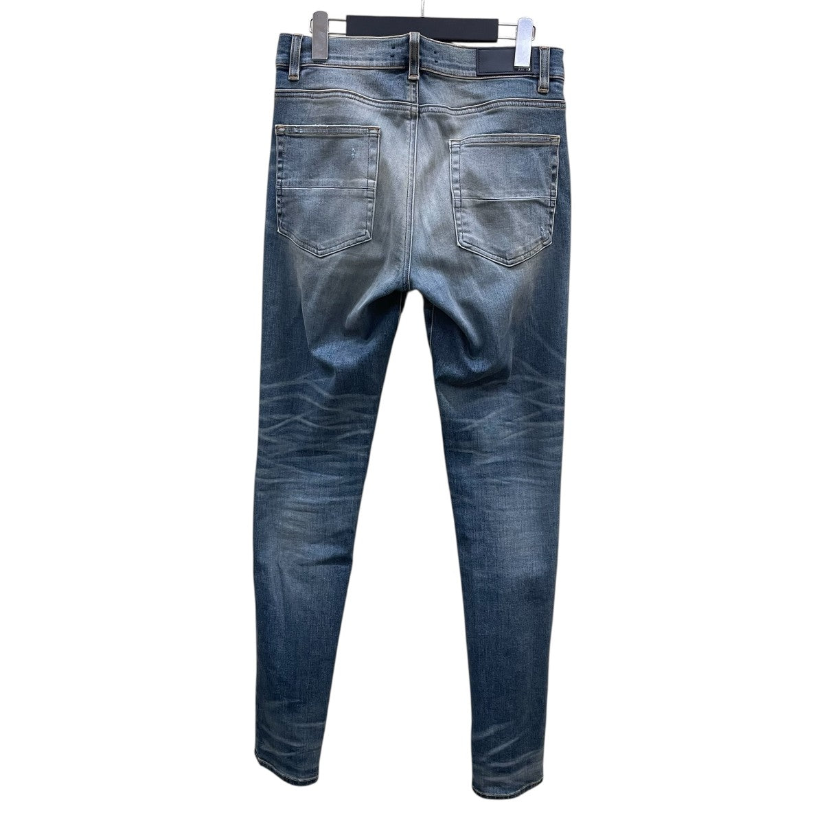 AMIRI(アミリ) ダメージ加工ペイントスキニーデニムパンツ
