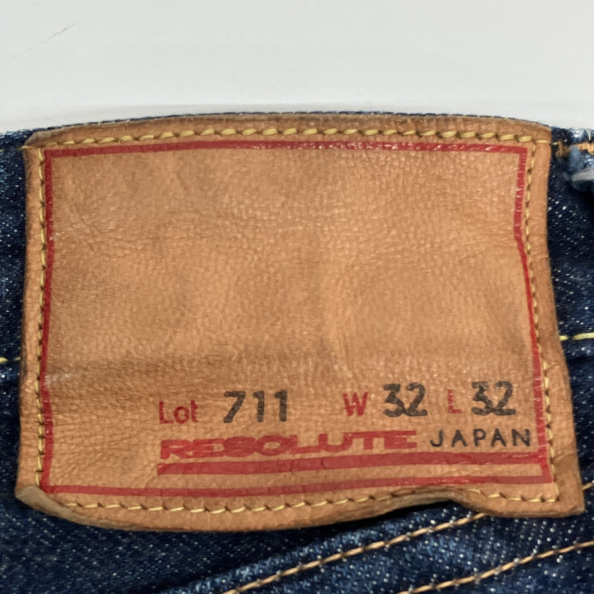 711デニムパンツ